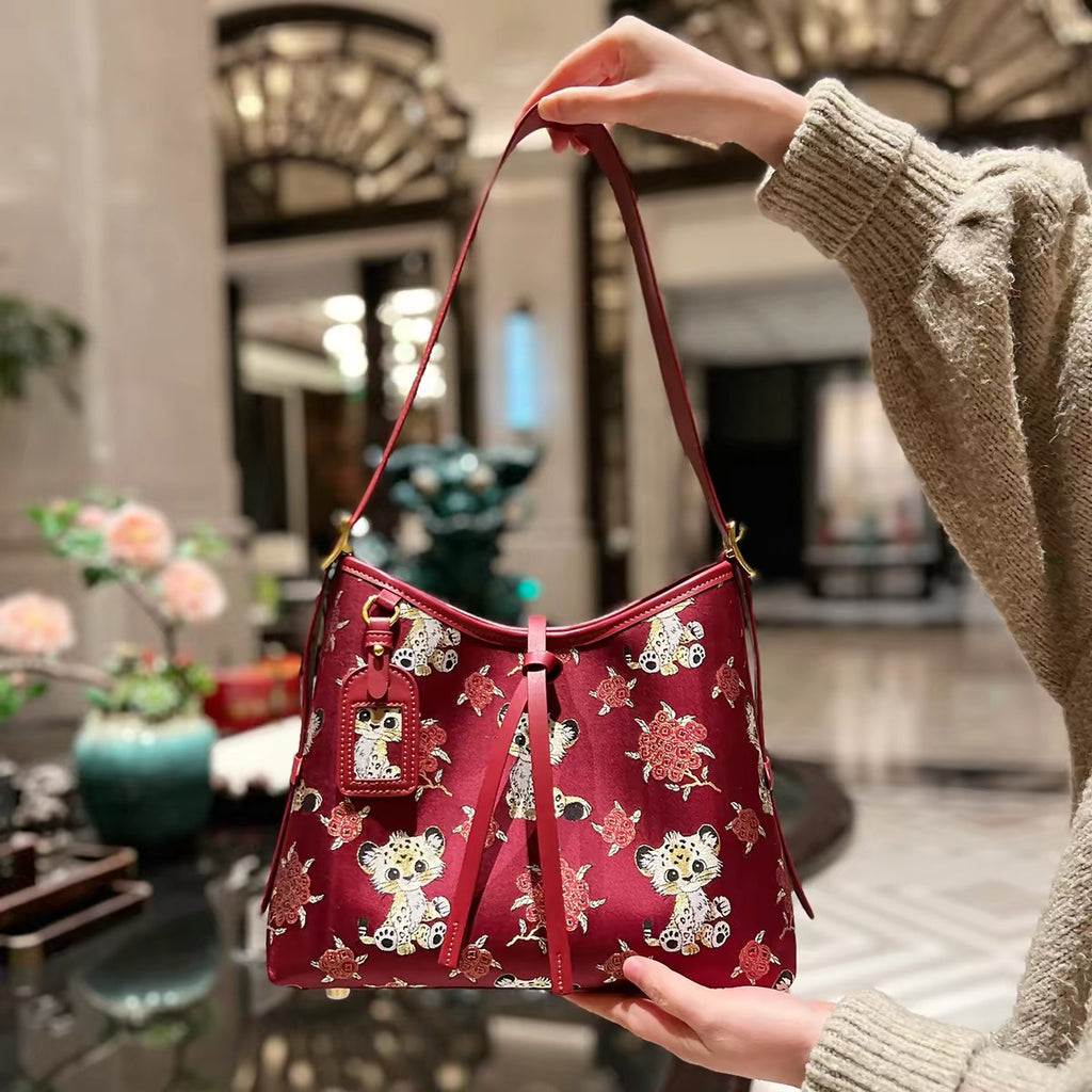 New Chinese-style intangible cultural heritage Songzhi silk braided bag for the lower part of the arm (female version)