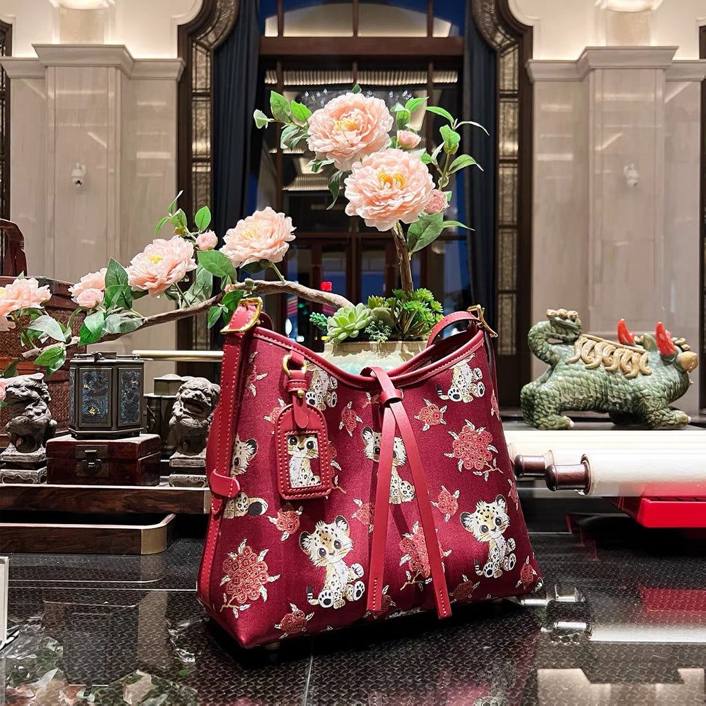 New Chinese-style intangible cultural heritage Songzhi silk braided bag for the lower part of the arm (female version)